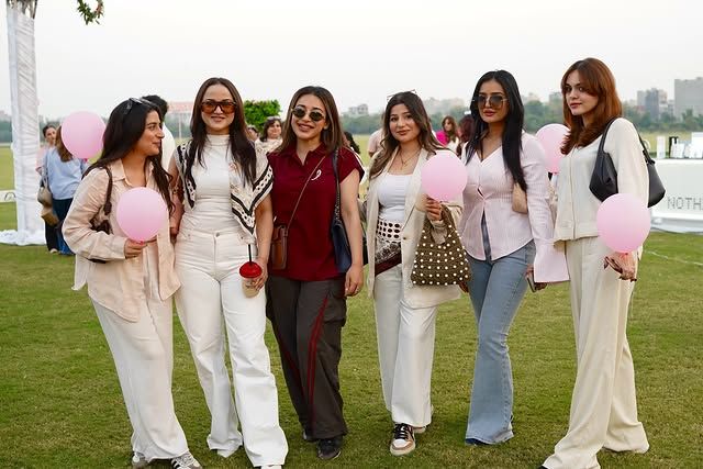 Pink balloons, big smiles and iced coffee for a good cause.